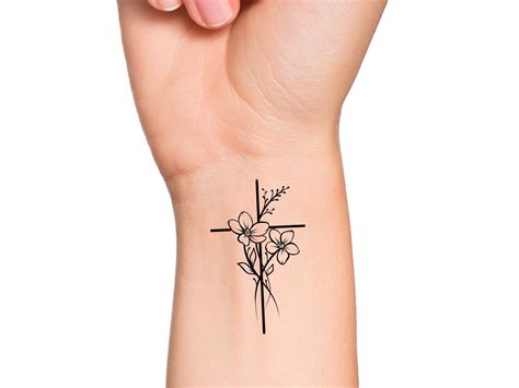 dainty floral cross tattoo|small feminine cross tattoos.